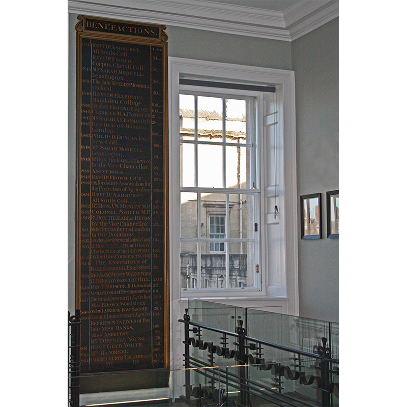 Secondary Glazing Units to reduce noise ingress next to the benefactors plaque at Radcliffe Infirmary, Oxford University