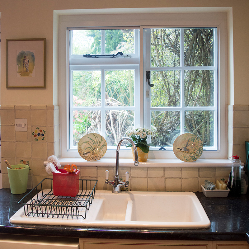 White secondary glazing in the kitchen windows for thermal improvements